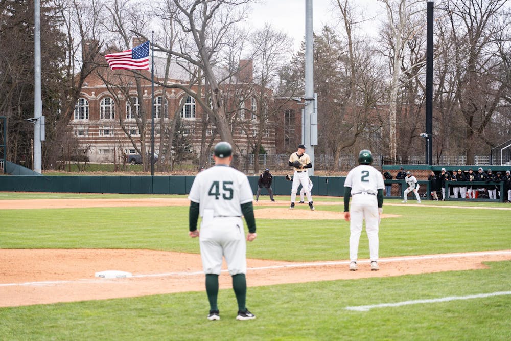 <p>The American Flag billows in the wind at McLane Baseball Stadium in East Lansing on Wednesday, March 27, 2024. The weather was cold and breezy during the Wednesday evening matchup and the Spartans fell 7-11 after chasing the Grizzlies most of the game.</p>