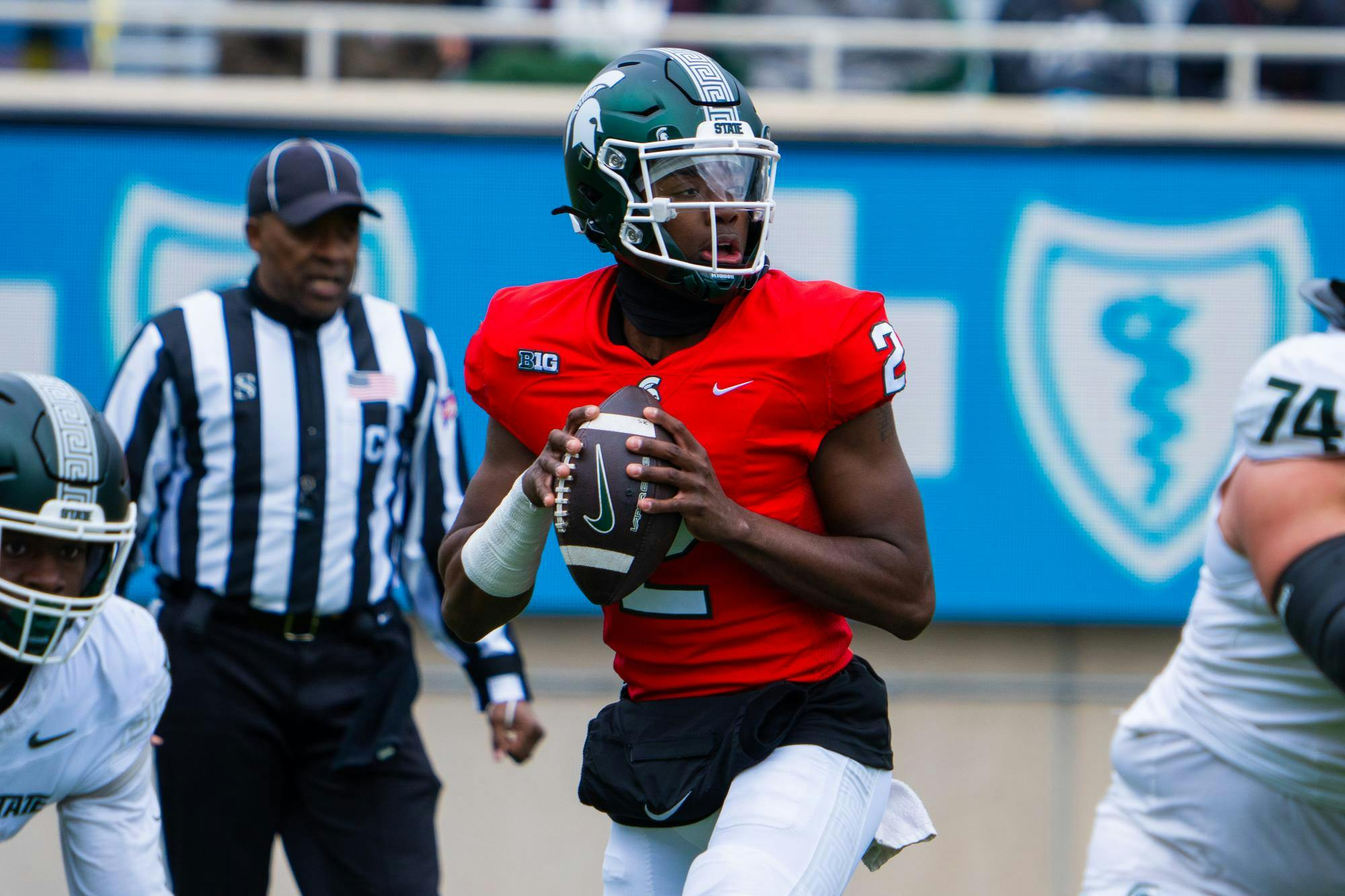 <p>Sophomore quarterback Aidan Chiles (2) scans the field for open receivers during MSU football’s 2024 Spring Showcase on April 20, 2024.</p>