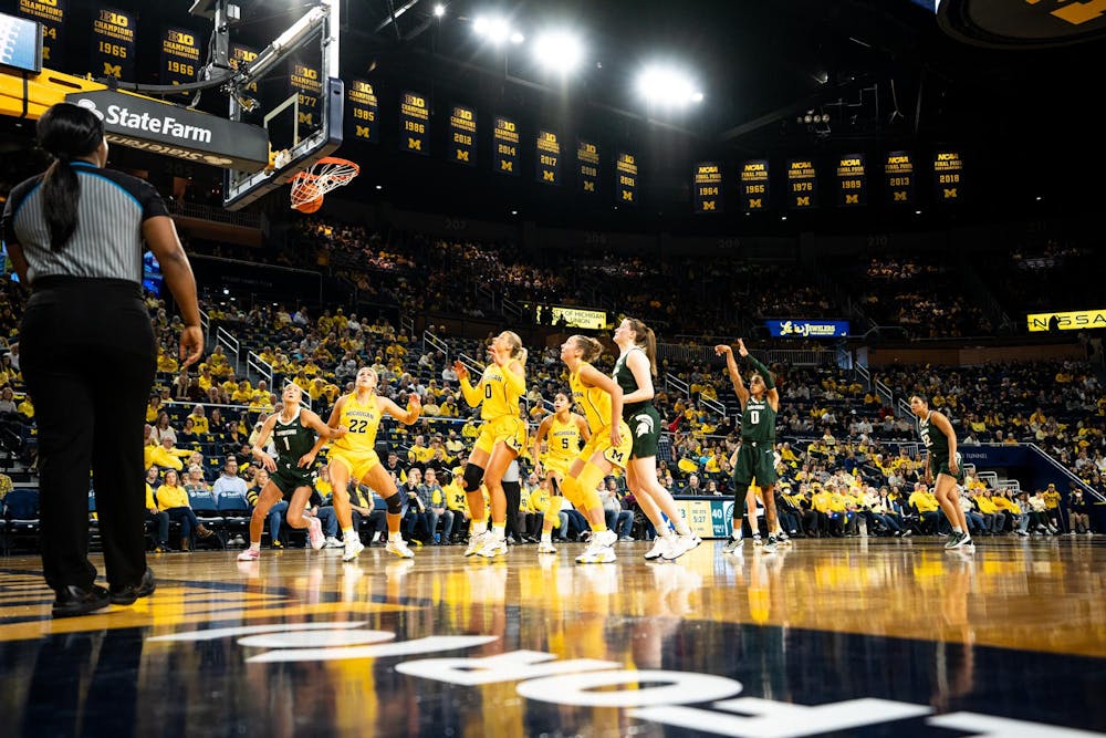 <p>Michigan State junior guard No. 1 DeeDee Hagemann shoots a free throw at the Crisler center in Ann Arbor on Feb. 18, 2024. Michigan State secured a season sweep of the rival Wolverines, breaking a two-game losing streak in the process.</p>