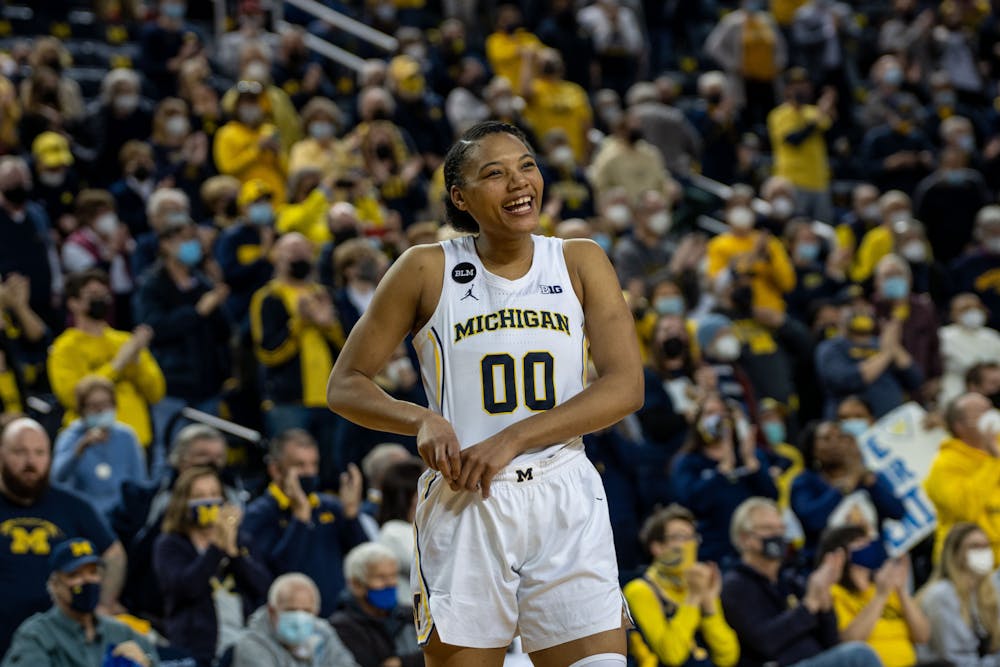 Senior forward celebrates after a successful senior day against the Spartans. The crowd gave her a standing ovation as she entered with her fellow seniors for the final moments of the game. The Wolverines defeated the Spartans 62-51 at the Crisler Center on Feb 24., 22.