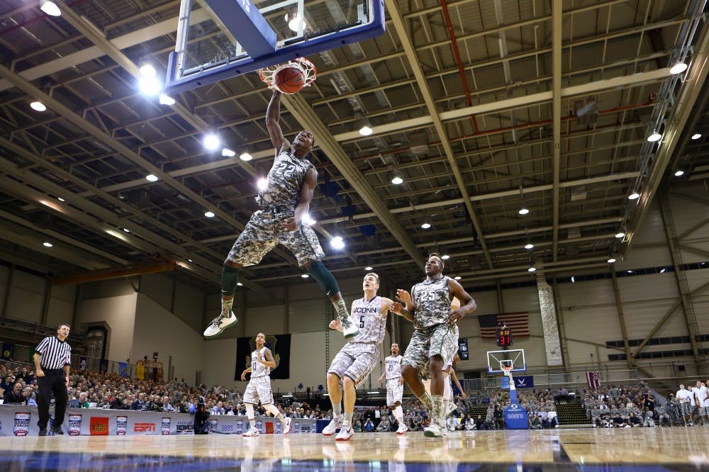 	<p>Sophomore guard Branden Dawson dunks the basket on Nov. 09, 2012, at Ramstein Air Base in Rheinland-Pfalz, Germany. The Huskies defeated the Spartans, 66-62. Matthew Mitchell/ <span class="caps">MSU</span> Athletic Communications</p>