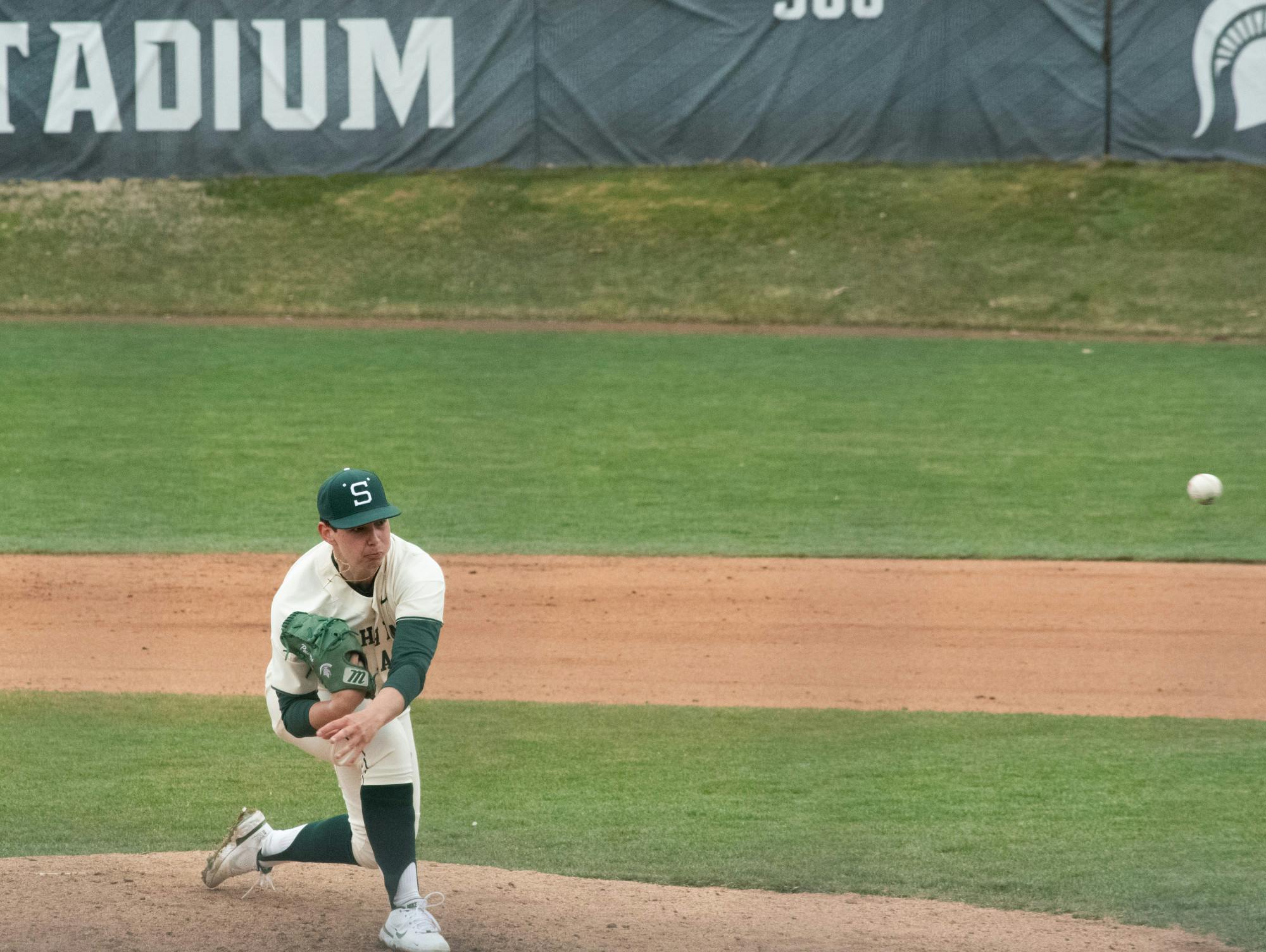 Michigan State's Nick Powers (46) pitches the ball in the Spartans' victory on March 28, 2021.