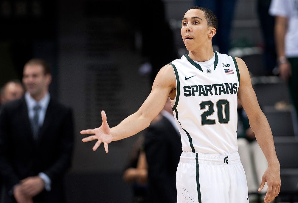 Sophomore guard Travis Trice signals to men's basketball head coach Tom Izzo during a game against Northwood on Tuesday, Oct. 30, 2012 at the Breslin Center. Katie Stiefel/ State News