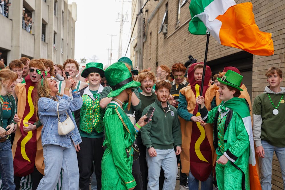 Michigan State University students participate in downtown East Lansing, Mich., for the Ginger Run on Saturday, March 14, 2026.