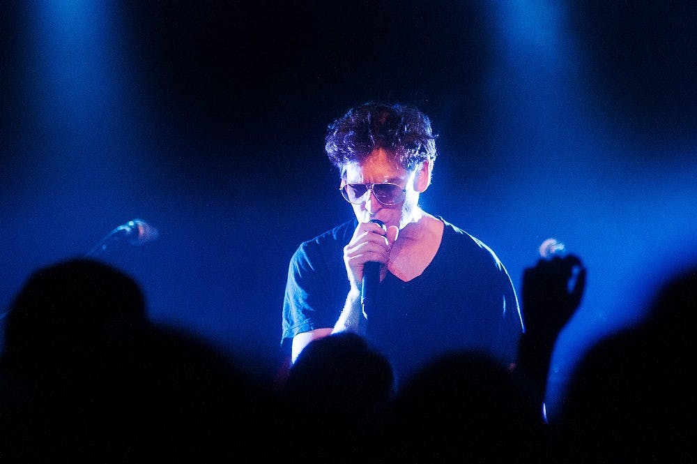 	<p>Reggae musician Matisyahu performs on stage for a sold-out audience Saturday, Nov. 10, 2012, at The Loft, 414 E. Michigan Ave. The concert brought a large number of college students to downtown Lansing. Adam Toolin/The State News </p>