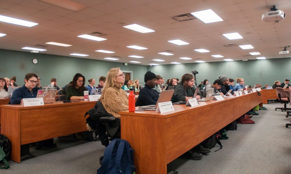 The general assembly sits during the debate about the bill to condemn MSU administration in regards to their handling of the Larry Nassar case on Jan. 18, 2018, at the MSU International Center. The bill passed with a unanimous vote.