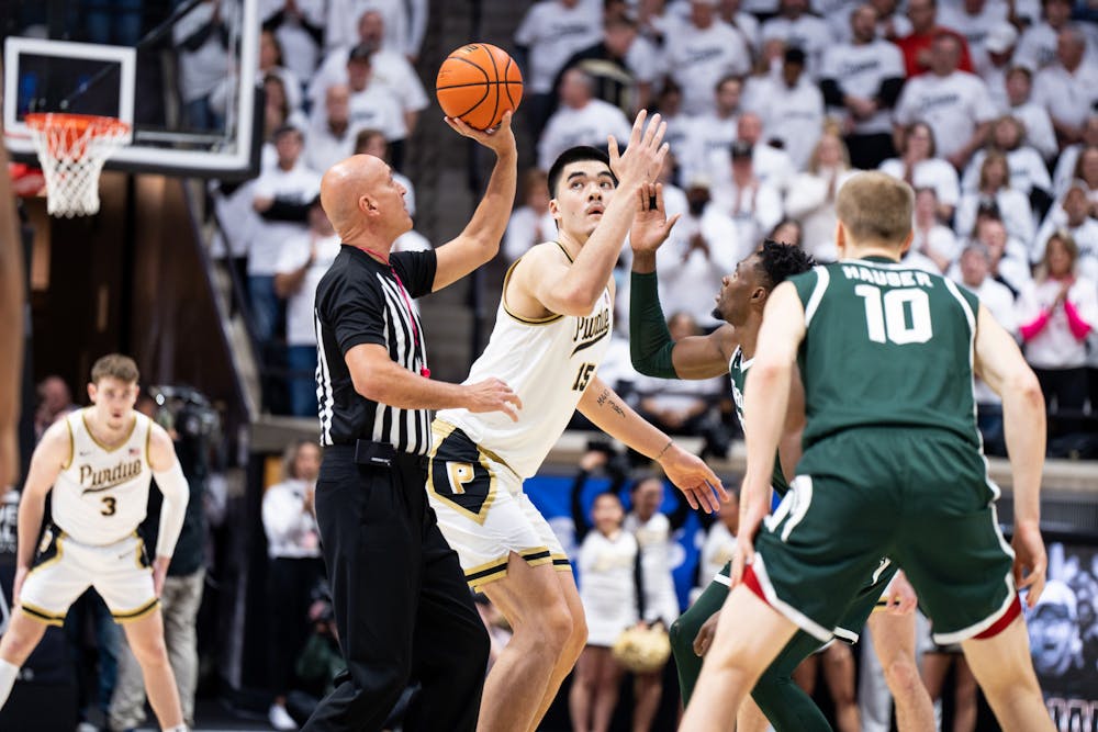 <p>Purdue's junior center Zach Edey (15) and MSU's junior center Mady Sissoko (22) await tip-off during a game at Mackey Arena on Jan. 29, 2023. The Spartans lost to the Boilermakers 77-61.</p>