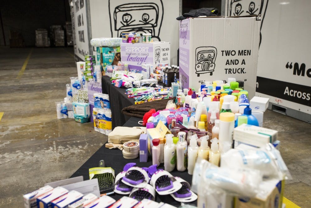 <p>Donated goods are displayed on April 13, 2017 at Two Men and a Truck in Lansing. Two Men and a Truck holds an annual drive called Movers for Moms to collect essential items for mothers in need who are in shelters for Mother's Day. The goods are delivered the week after Mother's Day.&nbsp;</p>