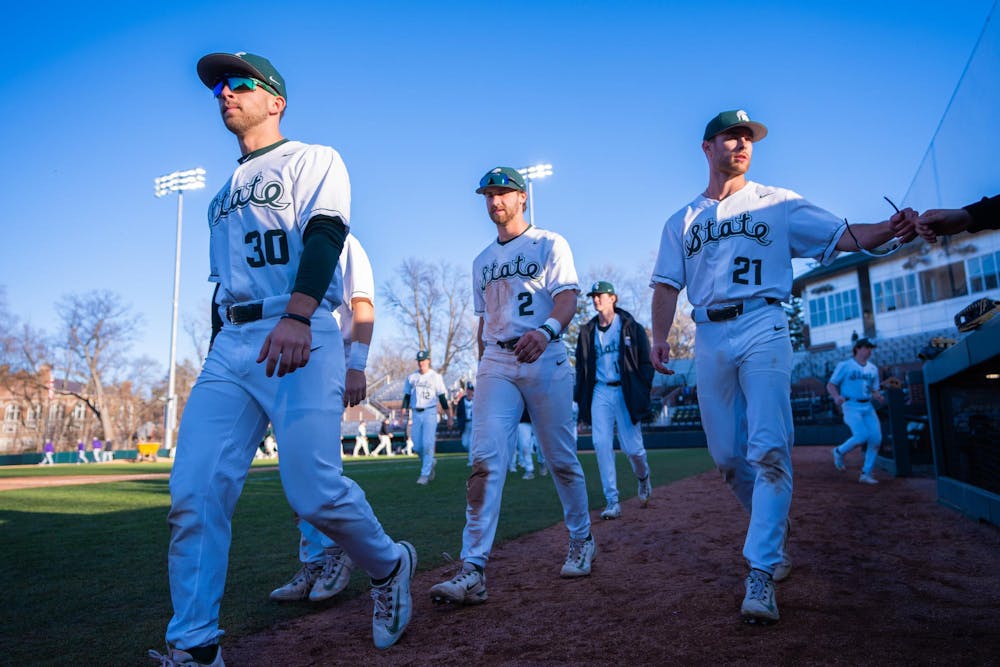 <p>MSU baseball players march victoriously off the field at McLane Baseball Stadium after their opening day victory against the University of Evansville on March 15, 2024.</p>