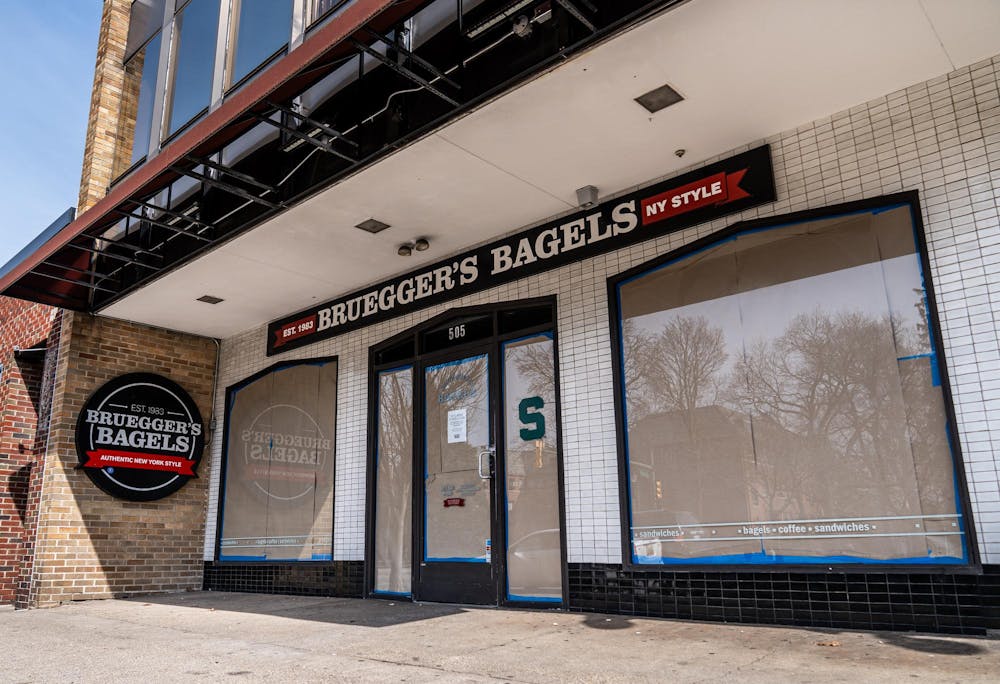 <p>Brueggers Bagels covers all its windows after closing on Grand River Ave. in East Lansing, MI on March 25, 2026.</p>