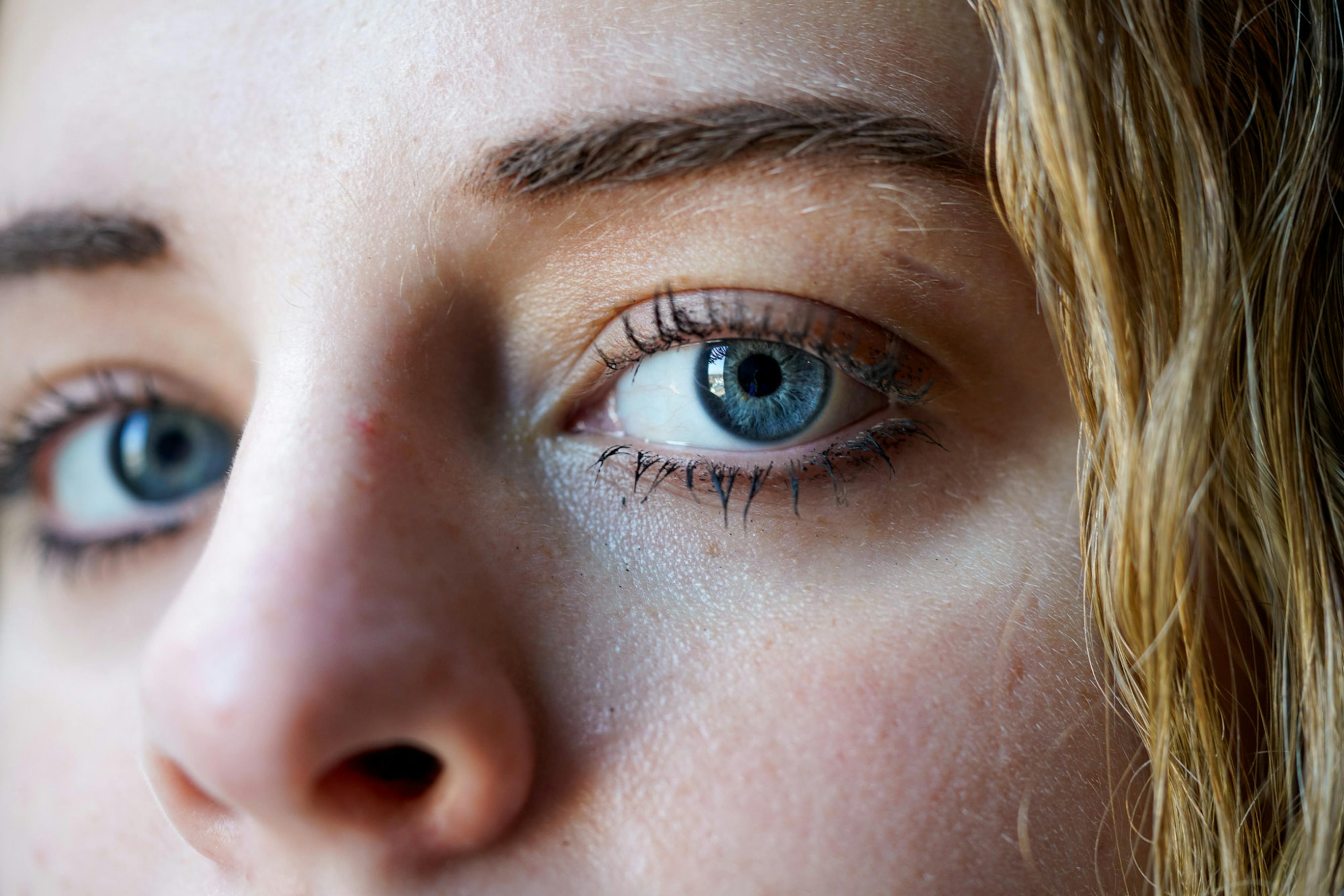 <p>Lilley Schatz, 22, of East Lansing, inside of her apartment on Dec. 7, 2023. After being sexually assaulted in September of 2022, Schatz has been on a journey to heal her trauma.</p>