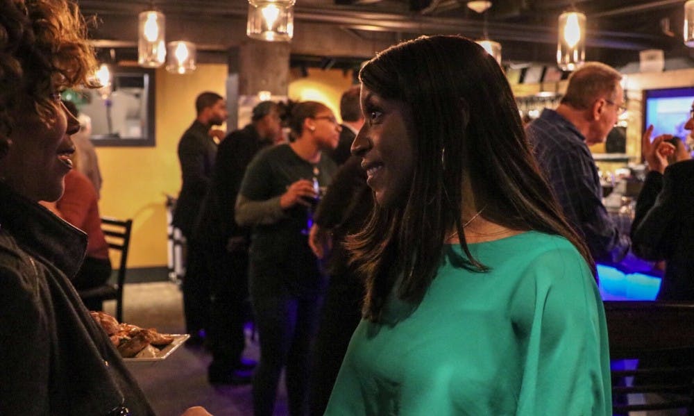 <p>Brianna Scott talks to members of the audience at her watch party Nov. 6, 2018.&nbsp;</p>