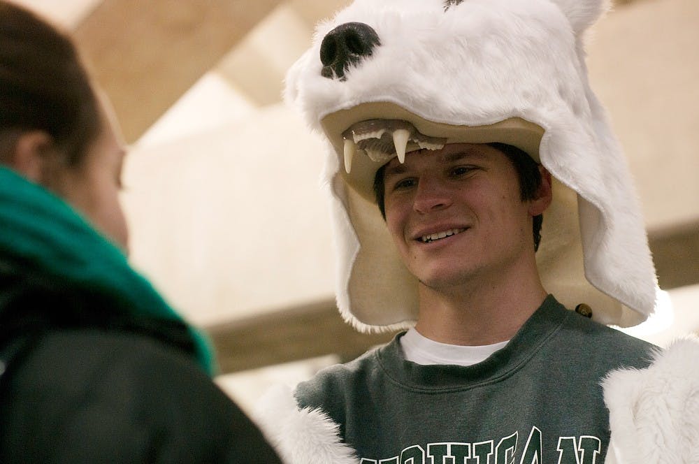	<p>No-preference sophomore David Berkompas waits for the men&#8217;s basketball game against Ohio State University on Jan. 7, 2014, at Breslin Center. He was dressed in a complete polar bear suit in an attempt to battle the temperature outside, about 2 degrees below zero. Betsy Agosta/The State News</p>
