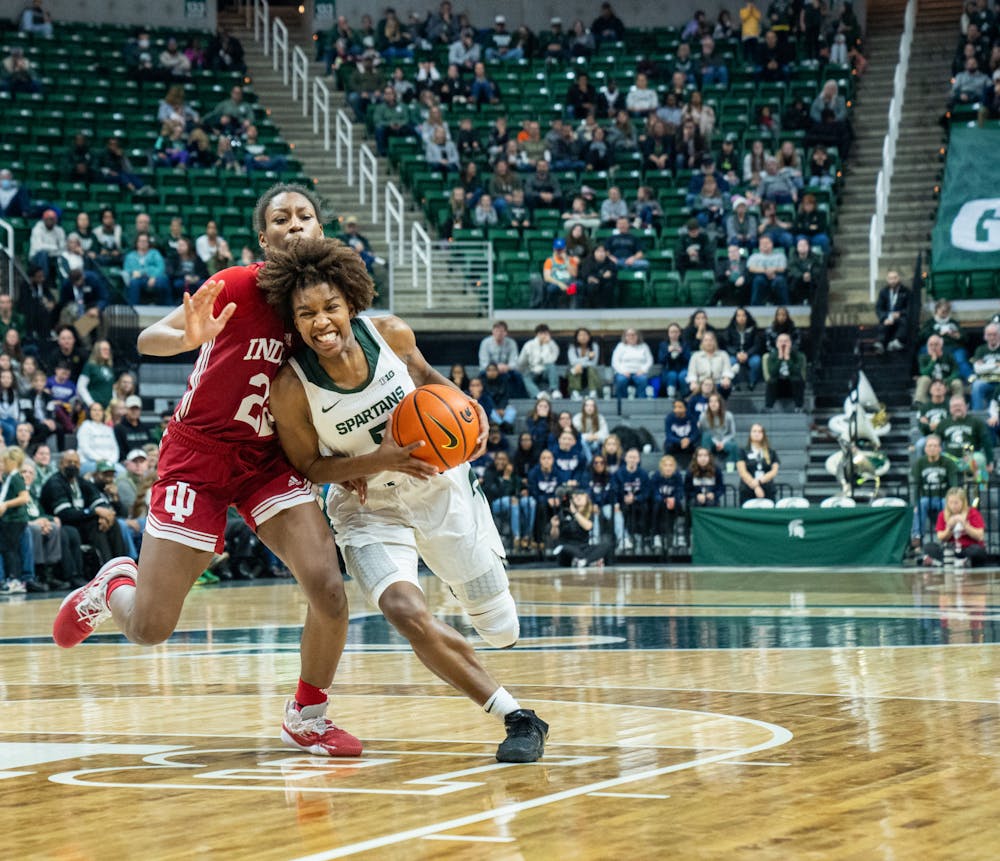 <p>Michigan State&#x27;s Kamaria McDaniel (5) defends the ball against Indiana&#x27;s Chloe Moore-McNeil (22) during the Spartan&#x27;s victory on Dec. 29, 2022.</p>