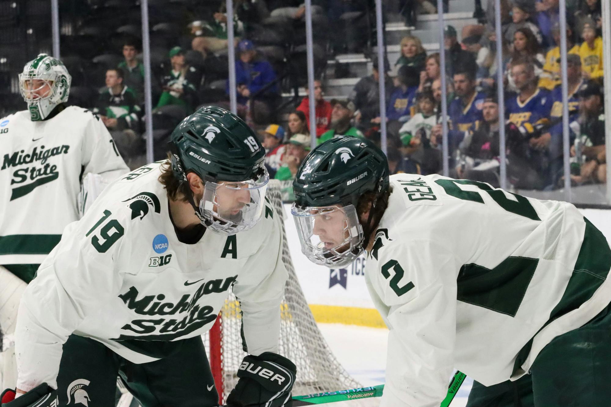 <p>Fifth year forward Nicolas Muller chats with freshman defenseman Patrick Geary moments before face off in a game against Western Michigan at Centene Ice Center on March 29, 2024.</p>