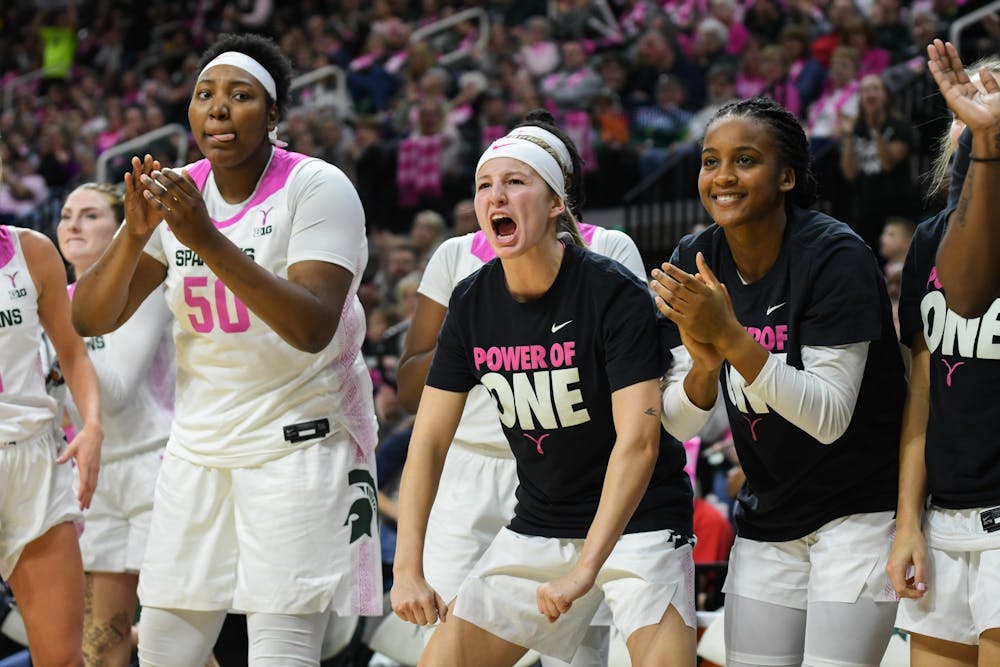 The Spartan bench celebrates a comeback during the women's basketball game against Michigan at the Breslin Center on February 23, 2020. The Spartans fell to the Wolverines 65-57. 