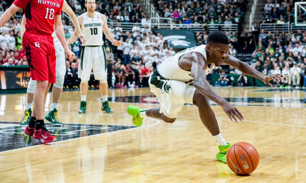 Junior guard Eron Harris runs for the ball during the second half of the game against Rutgers on Jan. 31, 2016 at Breslin Center. The Spartans defeated the Scarlet Knights, 96-62. 