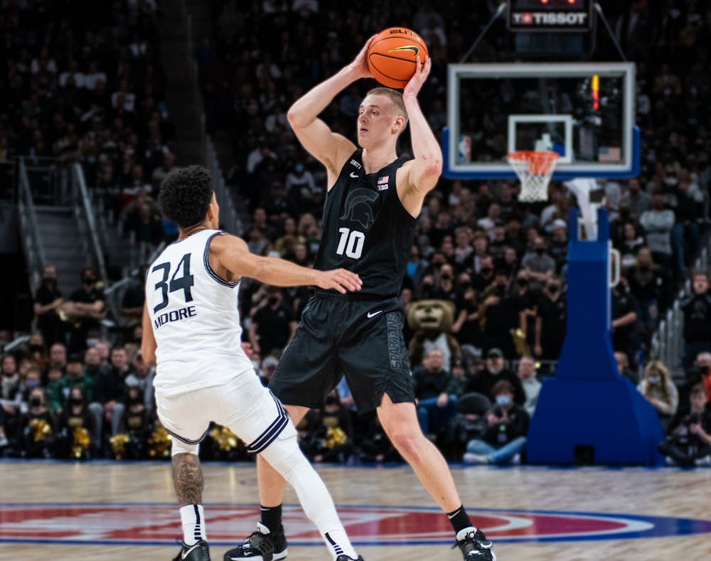 <p>MSU&#x27;s redshirt senior forward Joey Hauser (10) looks for the pass in the Spartans&#x27; game against the Oakland Golden Grizzlies at Little Caesars Arena on Tuesday, Dec. 21, 2021. </p><p></p>
