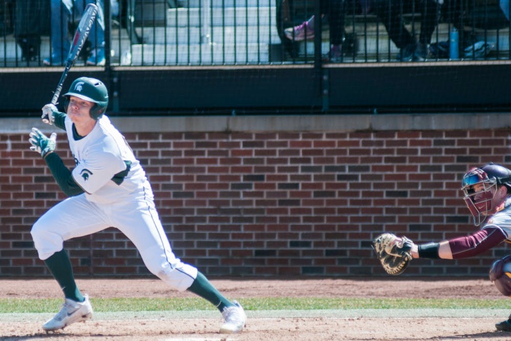 Freshman outfielder Bryce Kelley (17) looks to the ball after batting during the game against the University of Minnesota on April 1, 2017 at McLane Stadium at Kobs Field. The Spartans were defeated by the Goldy Gophers, 3-2.