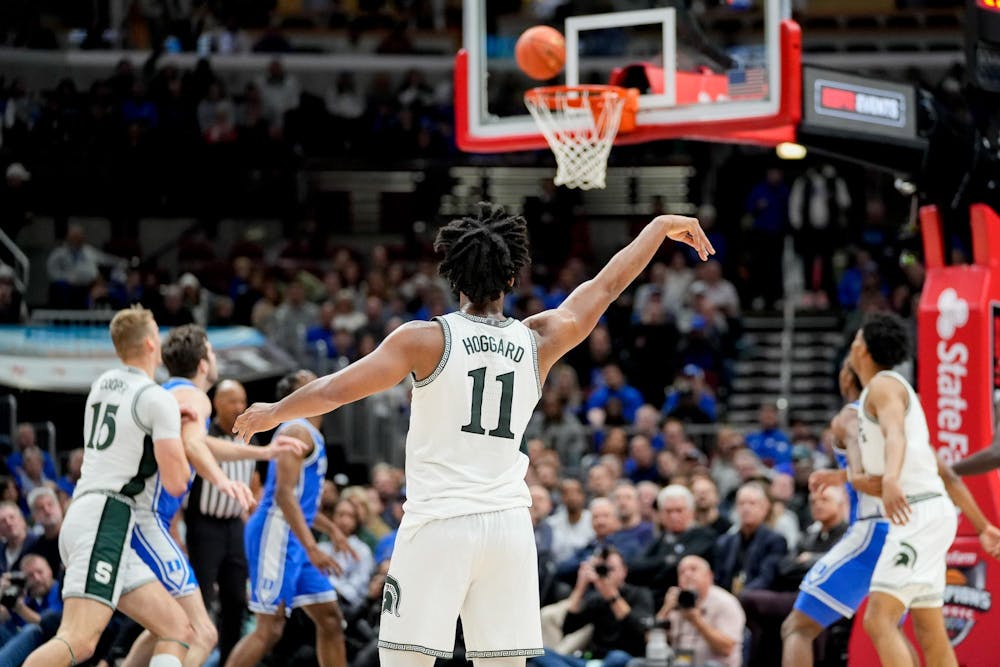 <p>Senior guard AJ Hoggard (11) misses a three-pointer during the first half of the Champions Classic at the United Center on Nov. 14, 2023</p>