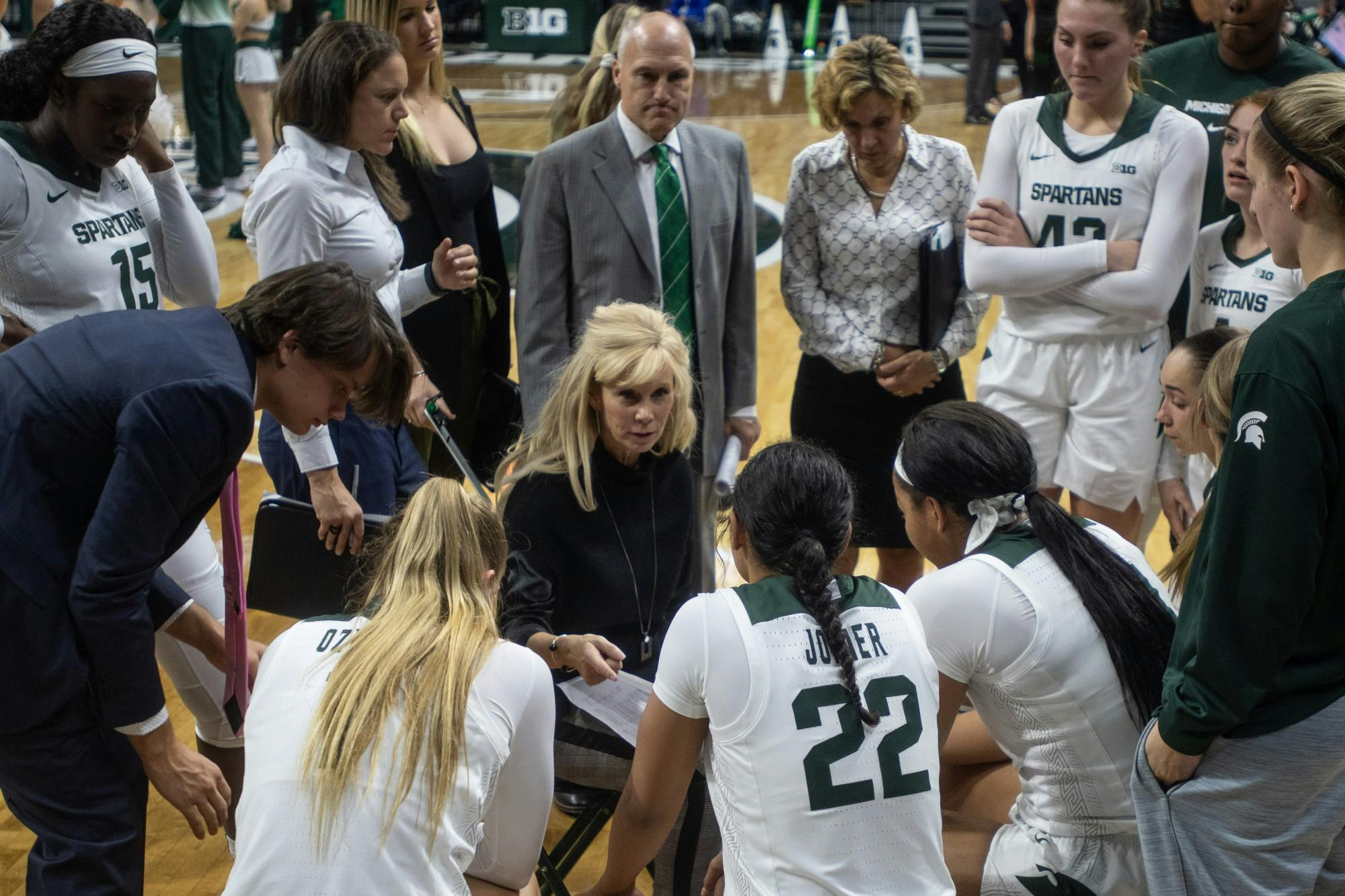 <p>Head Coach Suzy Merchant speaks to the team during the game against Eastern Michigan Nov. 5, 2019 at the Breslin Center.</p>
