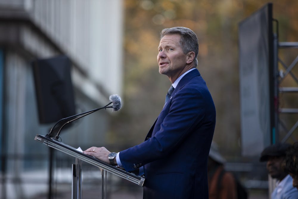 <p>Chancellor Kevin Guskiewicz speaks at the dedication of the memorial for James Lewis Cates, Jr. on Monday, Nov. 21, 2022. Photo taken by Ira Wilder and provided by The Daily Tar Heel.</p>