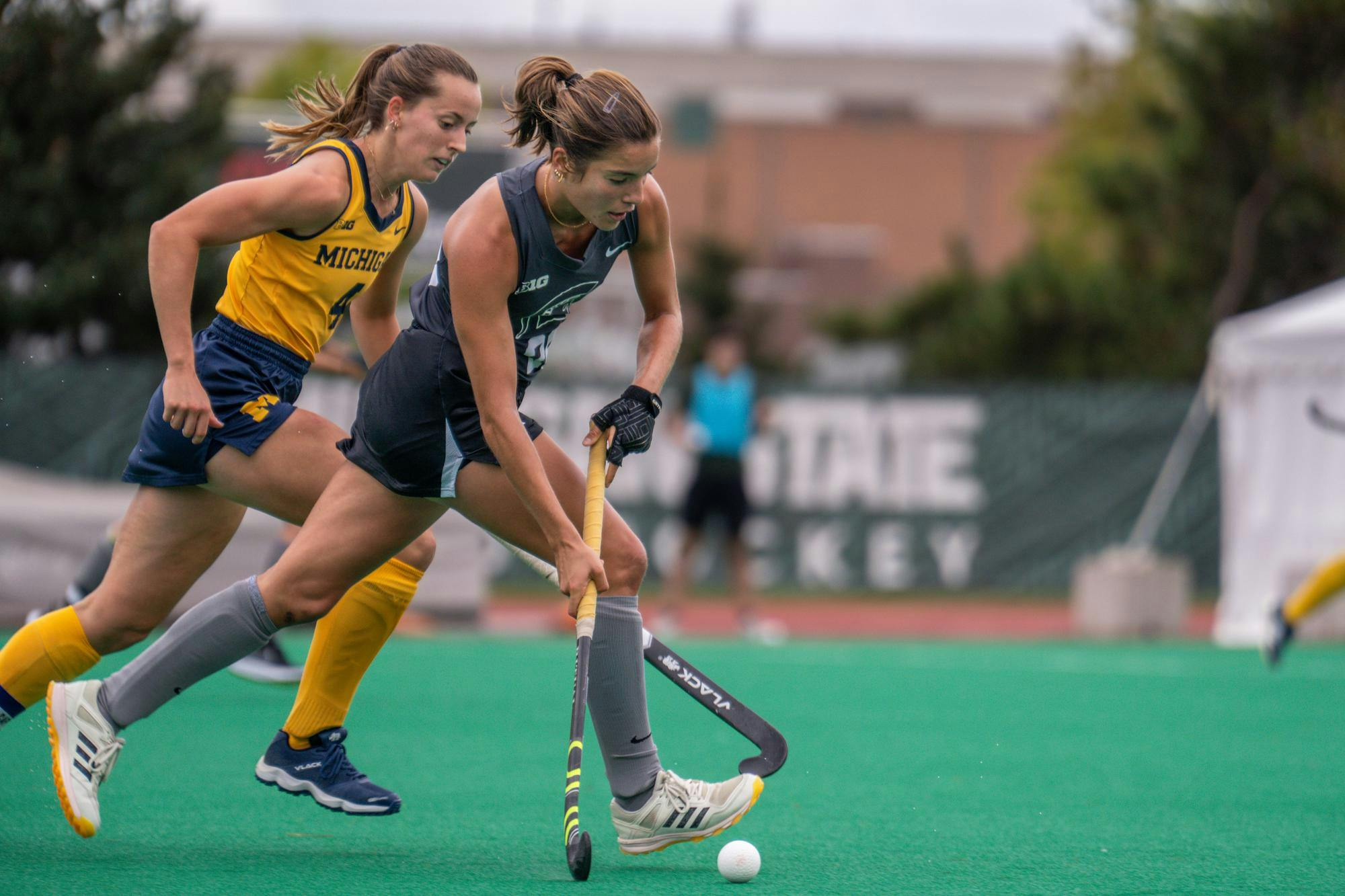 <p>Michigan State freshman midfielder Carmen Pucheta (20) runs the ball down the Ralph Young field on Sept. 23, 2024. The Wolverines took a 3-0 victory, resulting in a second straight conference loss for the Spartans.</p>