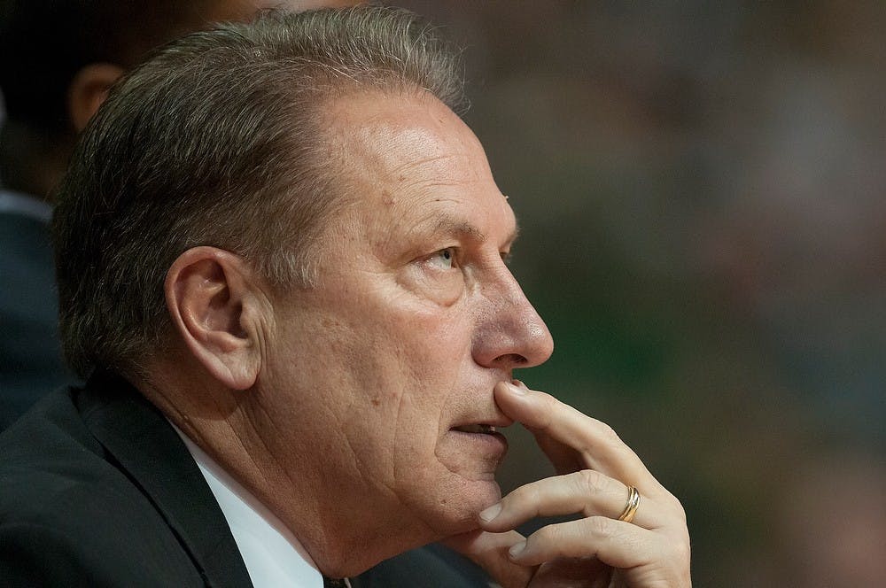 	<p>Men&#8217;s basketball head coach Tom Izzo watches a free throw from the sidelines during the game against Oakland on Dec. 14, 2013, at The Palace of Auburn Hills in Auburn Hills, Mich. The Spartans defeated the Grizzlies, 67-63. Danyelle Morrow/The State News</p>