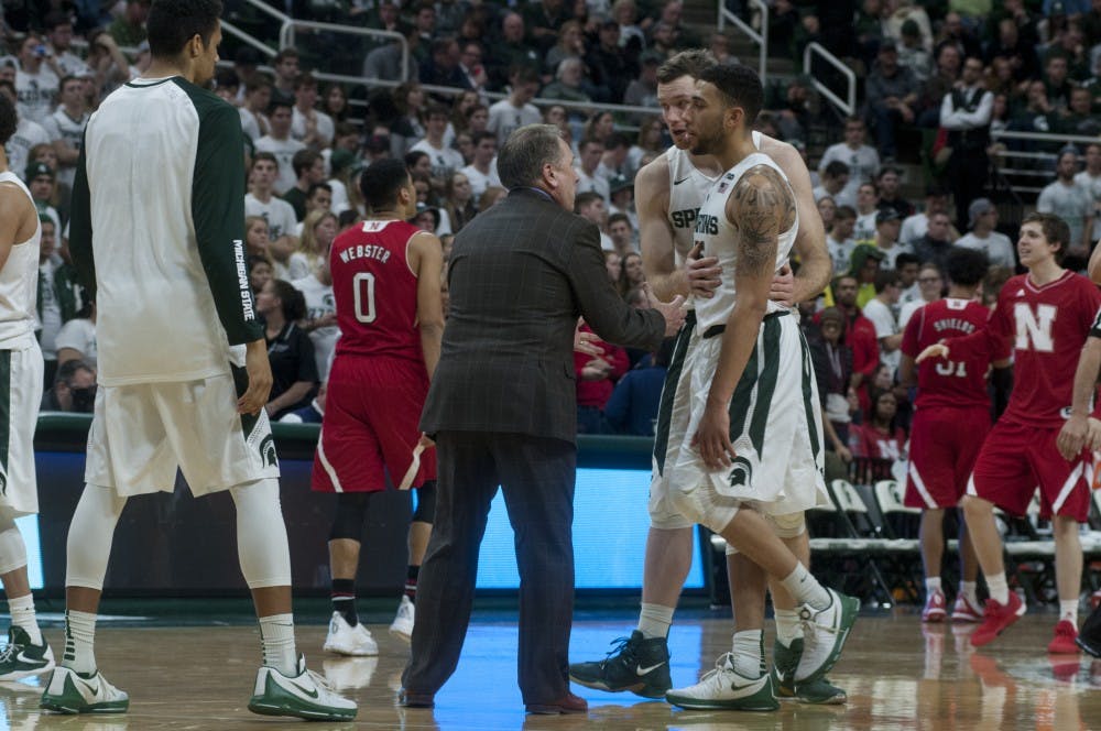 Head coach Tom Izzo talks to senior guard Denzel Valentine and senior forward Matt Costello during game against Nebraska on Jan. 20, 2016 at Breslin Center. The Spartans were defeated by the Cornhuskers, 72-71.