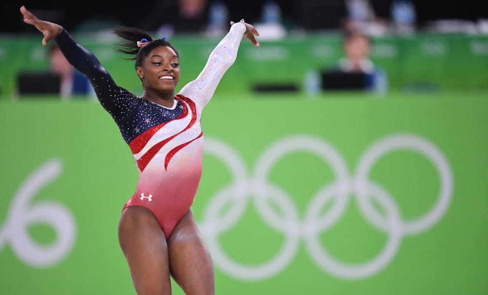 <p>U.S. gymnast Simone Biles competes in the floor exercise on Tuesday, Aug. 9, 2016, at the Rio Olympic Games in Rio De Janeiro, Brazil. The U.S. women's squad captured the gold medal in the team competition. Photo courtesy: Mark Reis/Colorado Springs Gazette/Tribune News Service</p>