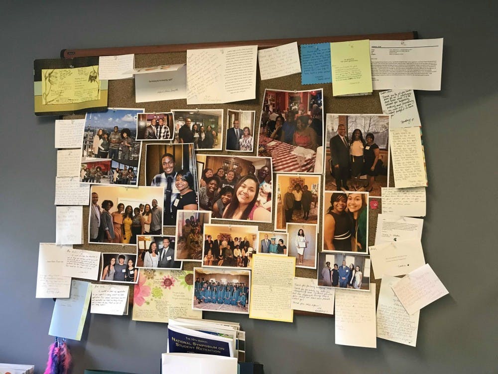 <p>Ariel Robbins, assistant director of the Charles Drew Scholars program and academic advisor, is the recipient of the 2018 Outstanding Established Advisor Award. The board in her office has many pictures of her with students in the program.&nbsp;</p>