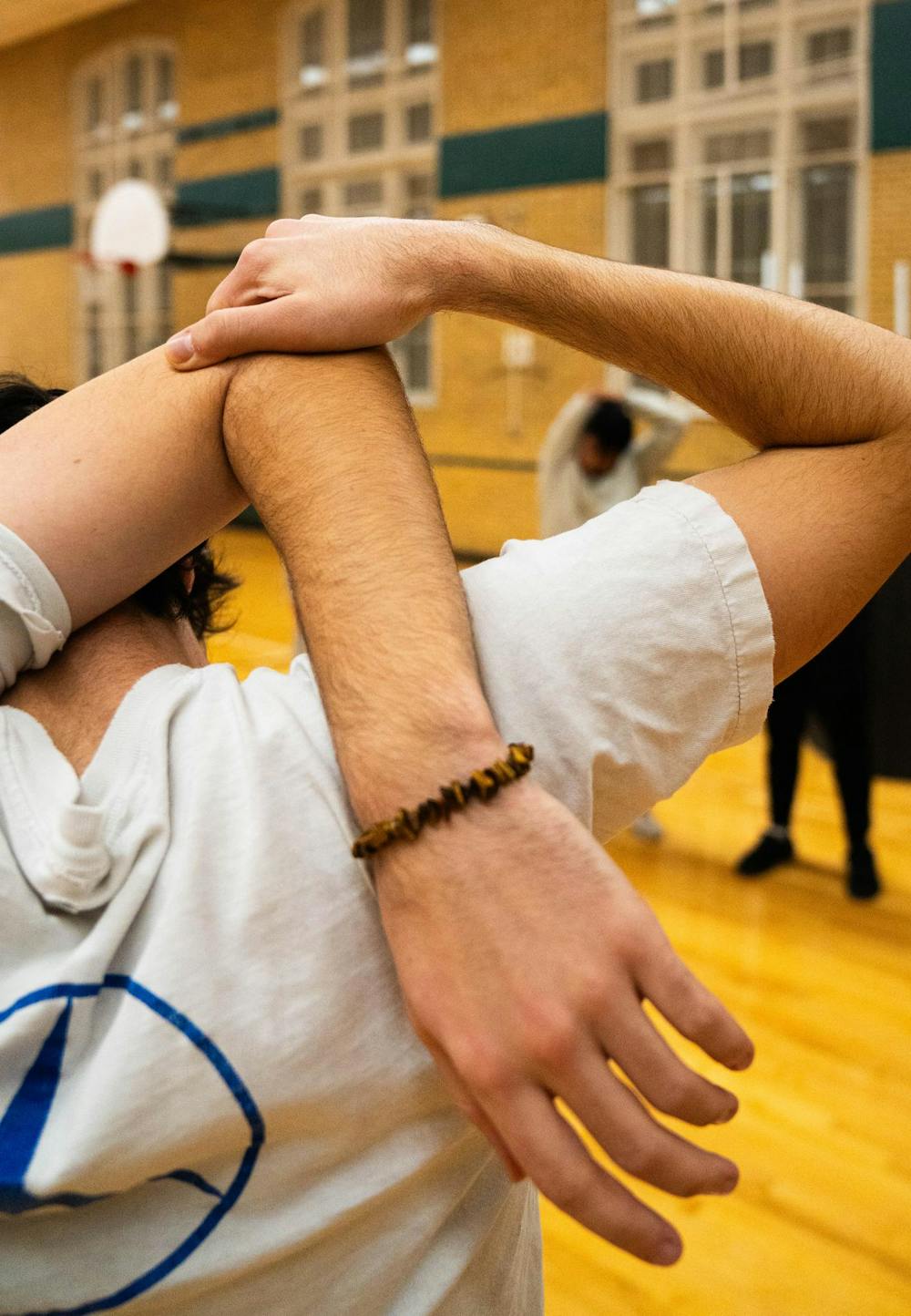 Dance team stretches at IM Circle, in East Lansing, on Dec. 2nd, 2025.