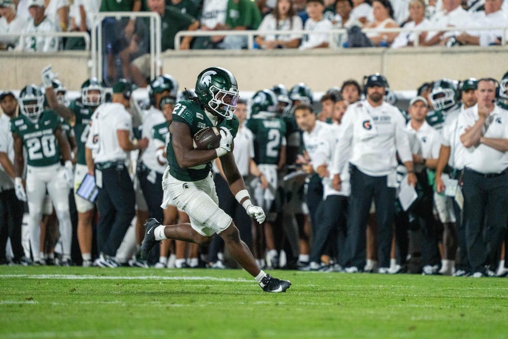 <p>Marvis Parrish (21) runs with the ball during the Michigan State vs. Toledo football game at Spartan Stadium in East Lansing, Mich., on Friday, Sept. 4, 2026.</p>