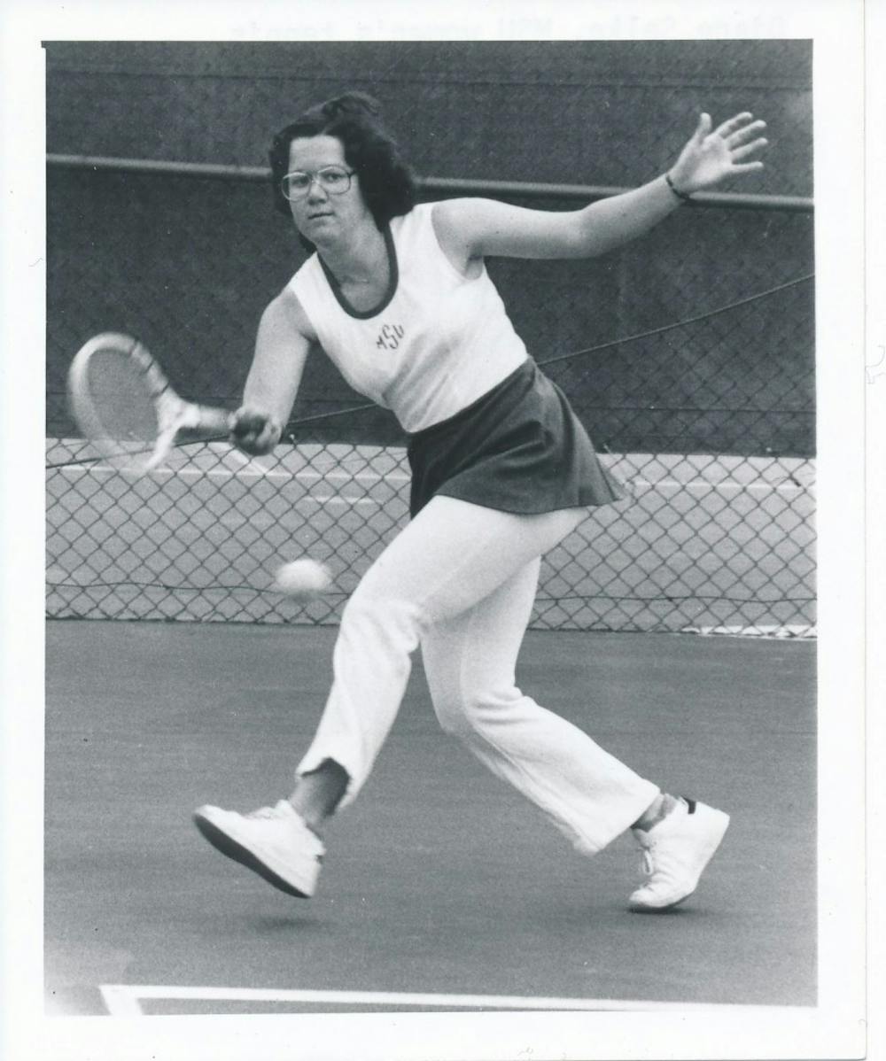 <p>MSU alumna Diane Selke looks to return the ball back over the net in her days as an MSU tennis player. Photo courtesy of MSU&nbsp;Athletic Communications&nbsp;</p>