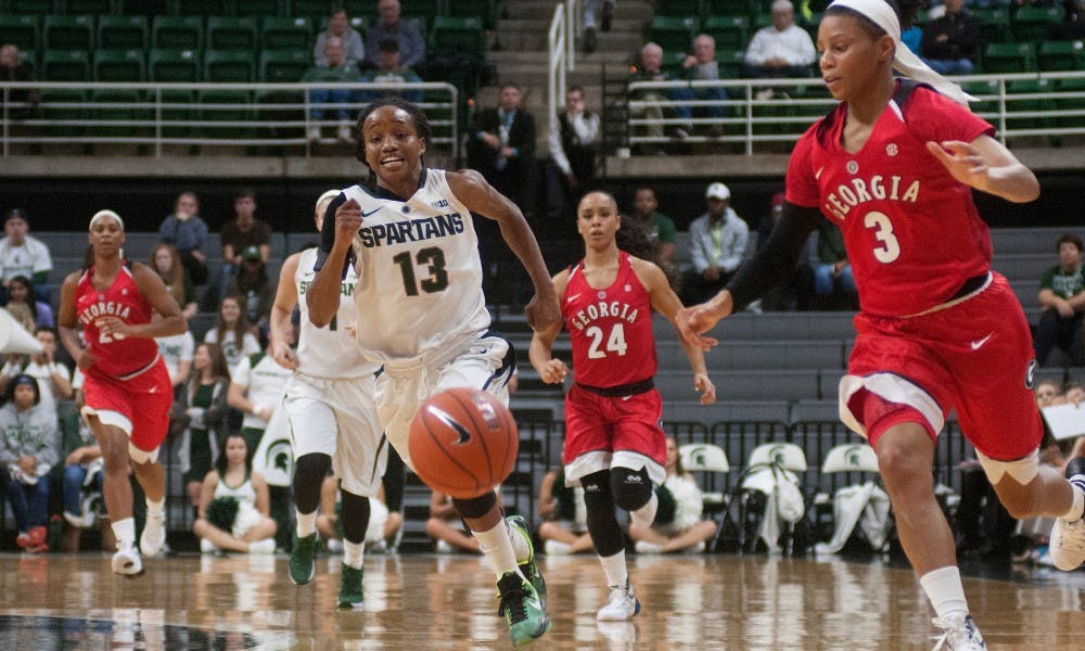 <p>Sophomore guard Morgan Green chases after the ball during the game against Georgia on Nov. 18, 2015 at Breslin Center. The Spartans beat the Lady Bulldogs, 66-45.</p>