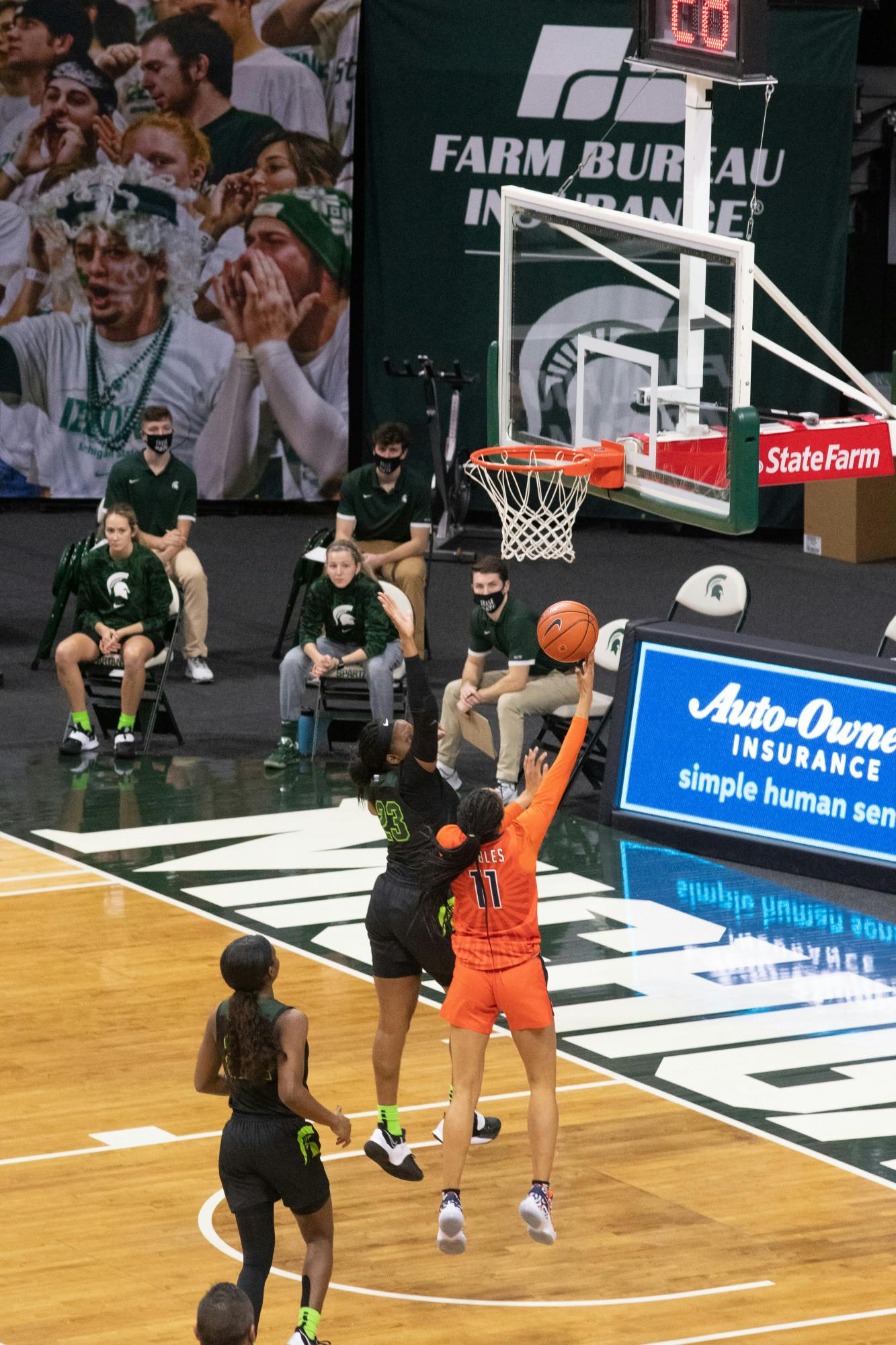 <p>Spartan Janai Crooms (23) blocks Jada Peebles (11) in the Spartans&#x27; victory against Illinois on Feb. 4, 2021.</p>