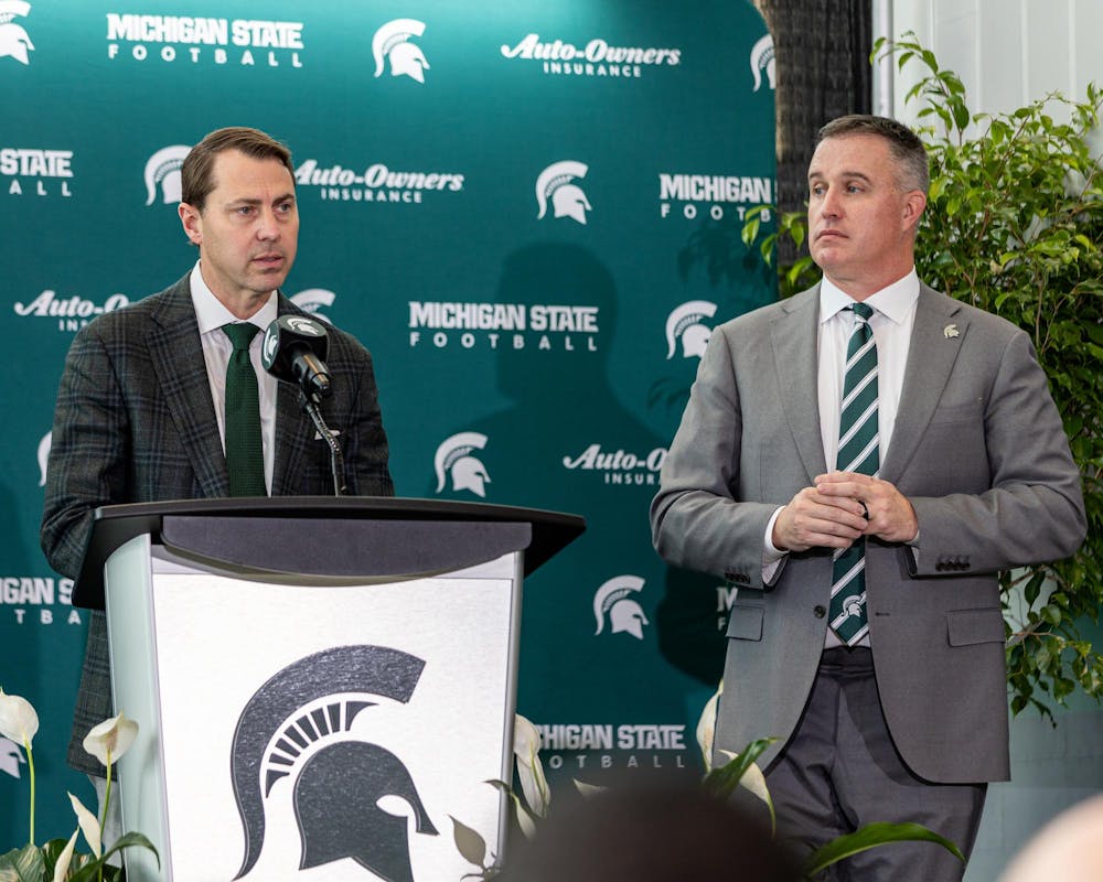 MSU's new football HC Pat Fitzgerald and AD J. Batts take turns answering questions from the crowd in the Tom Izzo football building in East Lansing, MI on Dec. 2, 2025.
