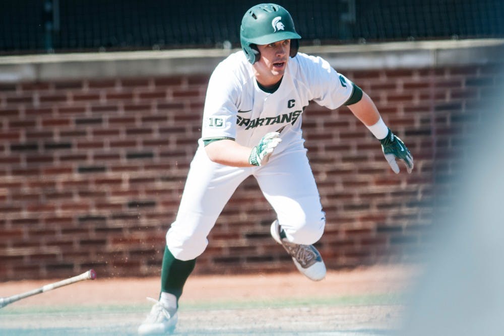 Senior infielder Dan Durkin (9) runs to first base during the game against the University of Minnesota on April 1, 2017 at McLane Stadium at Kobs Field. The Spartans were defeated by the Goldy Gophers, 3-2.