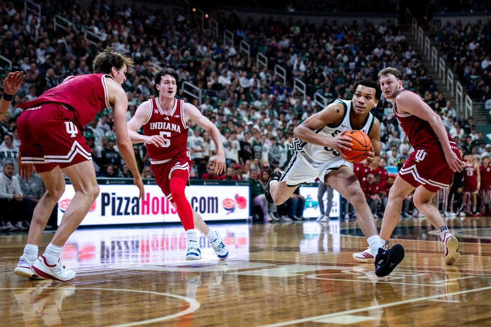 <p>Michigan State Spartans forward Coen Carr (55) strides during an NCAA Division I basketball game between Michigan State and Indiana at the Breslin Center in East Lansing, Michigan, on Tuesday, Jan. 13, 2026.</p>