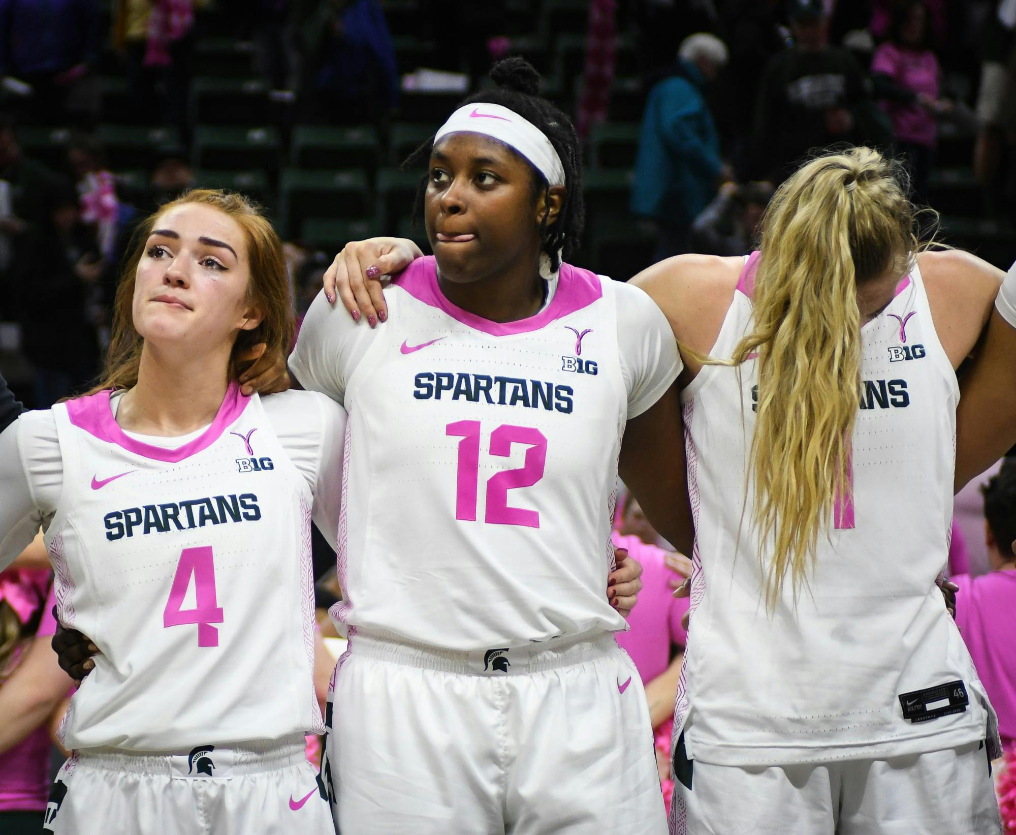 <p>Taryn McCutcheon (4), Nia Hollie (12), and Tory Ozment (1) following the women&#x27;s basketball game against Michigan at the Breslin Center on Feb. 23, 2020. The Spartans fell to the Wolverines, 65-57. </p>