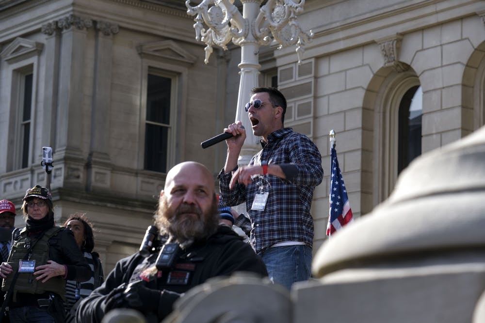 <p>Co-founder of the American Patriot Council, Ryan Kelley, speaks to the crowd at the &quot;Stop the Steal&quot; event at Michigan&#x27;s Capitol on November 14, 2020.</p>