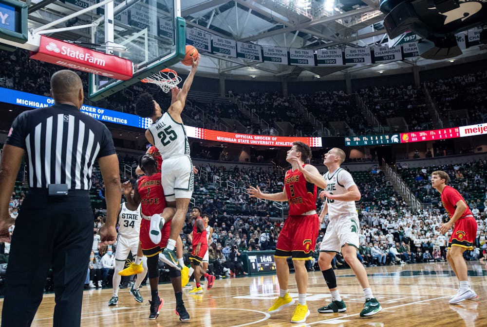 <p>Junior forward Malik Hall attempts a layup during Michigan State&#x27;s victory over Ferris State on Oct. 27, 2021.</p>