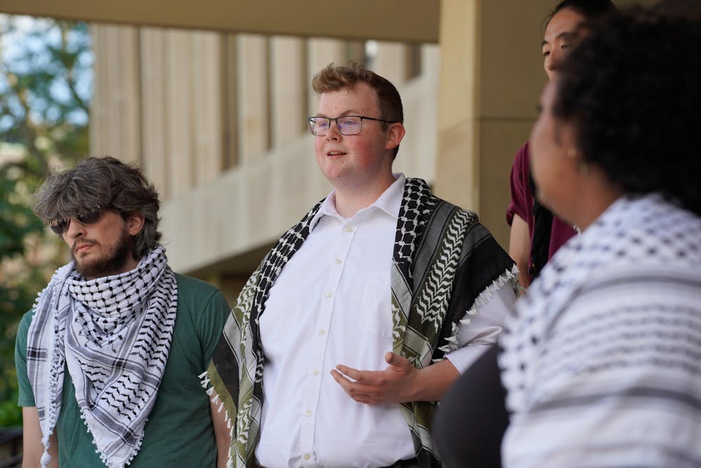 Jesse Estrada White speaks about divestment at Hurriya Coalition press conference after meeting with university administration on June 24, 2024.