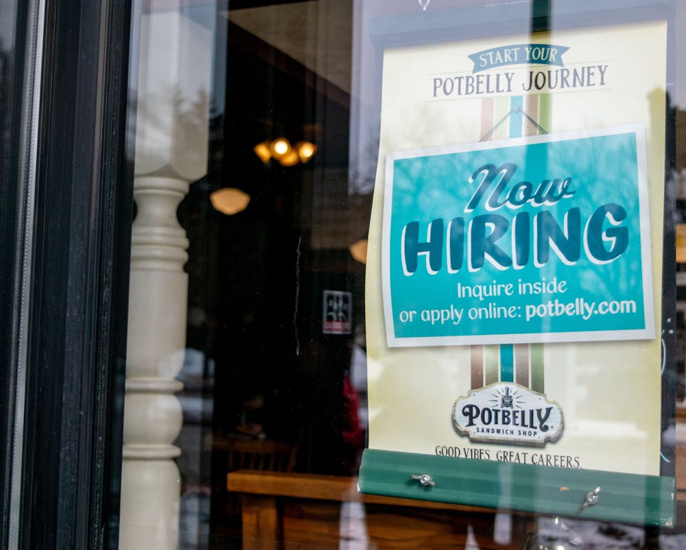 <p>Potbelly Sandwich Shop features a now hiring sign in their window on Feb. 15,2022. Most businesses are experiencing labor shortages due to the COVID-19 pandemic. </p>