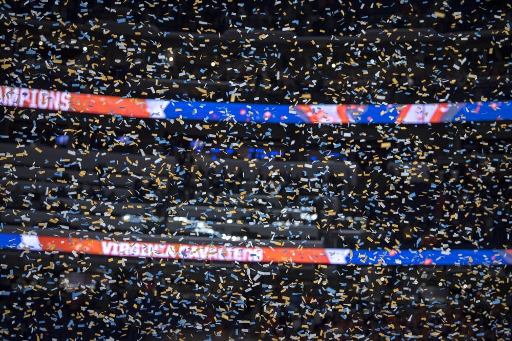 Confetti falls after Virginia defeated Texas Tech in the NCAA Tournament Championship game at U.S. Bank Stadium in Minneapolis on April 8, 2019. Virginia defeated Texas Tech in overtime 85-77. (Nic Antaya/The State News)