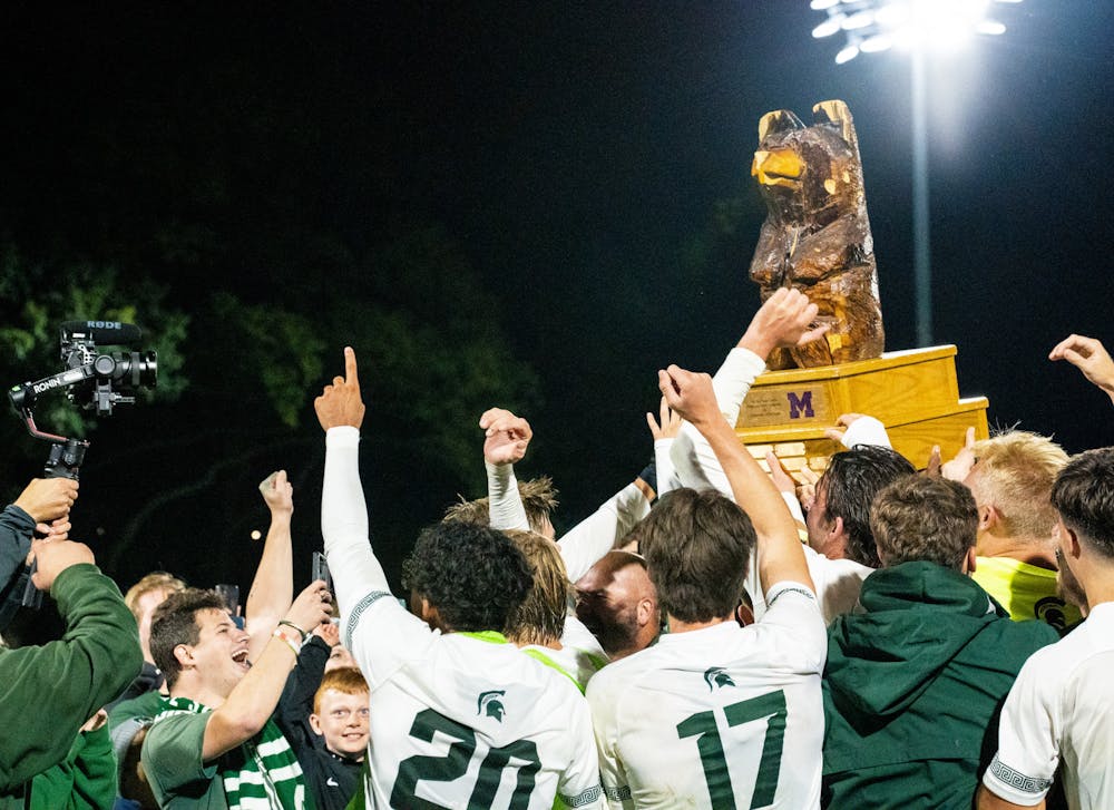 <p>The MSU men&#x27;s soccer team celebrates their win against the University of Michigan men&#x27;s soccer team at DeMartin Stadium on Sept. 27, 2022. Spartans defeated the Wolverines 2-0. </p>