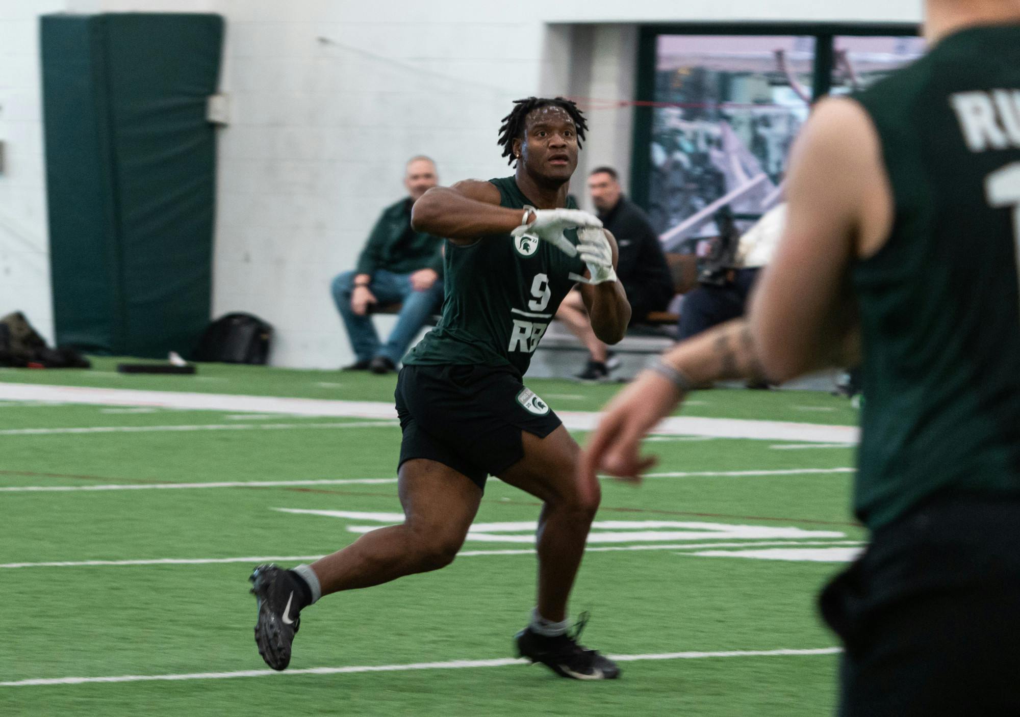 <p>Michigan State junior Kenneth Walker III during Pro Day on-field position drills, on Mar. 16, 2022 at the Duffy Daugherty Indoor Football Building.</p>