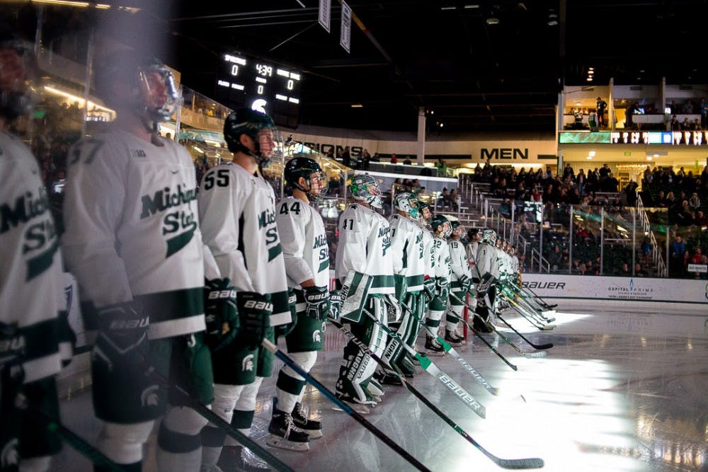 Spartan hockey players line up before the game against Notre Dame on Nov. 16, 2018 at Munn Ice Arena. The Spartans fell to the Fighting Irish, 3-1. 