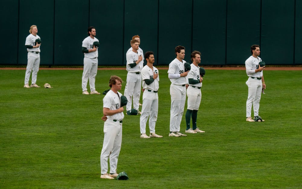 <p>During warmups the MSU baseball players stop for the pledge on April 13, 2022. MSU would end up losing the game 18-7 against Western Michigan.</p>