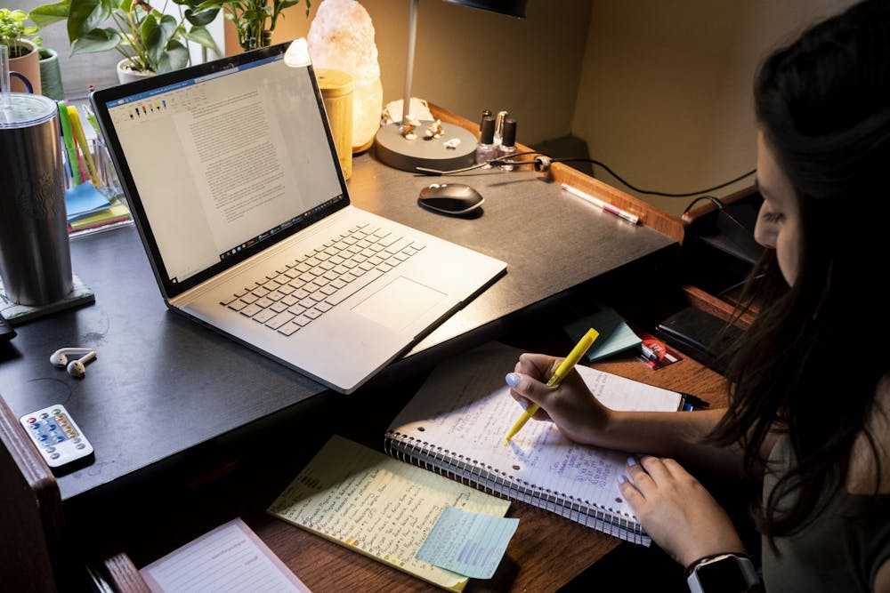 <p>Maya Salamey, a then-rising sophomore at MSU, worked on homework for her summer classes in her dorm Holden Hall on MSU&#x27;s campus on June 24, 2021. Salamey makes a to-do list to help keep her organized with her online classes. </p>